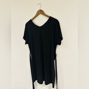 Black dress from SHEIN with cute tie details in the back! Size medium.